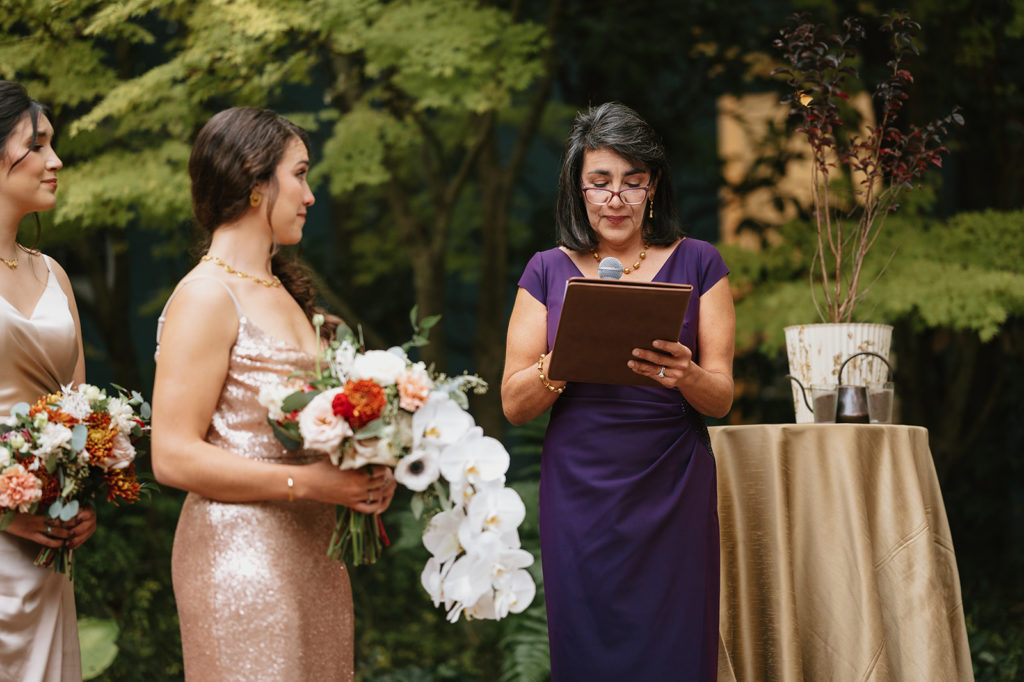 Mother of the Bride reads a poem during wedding ceremony