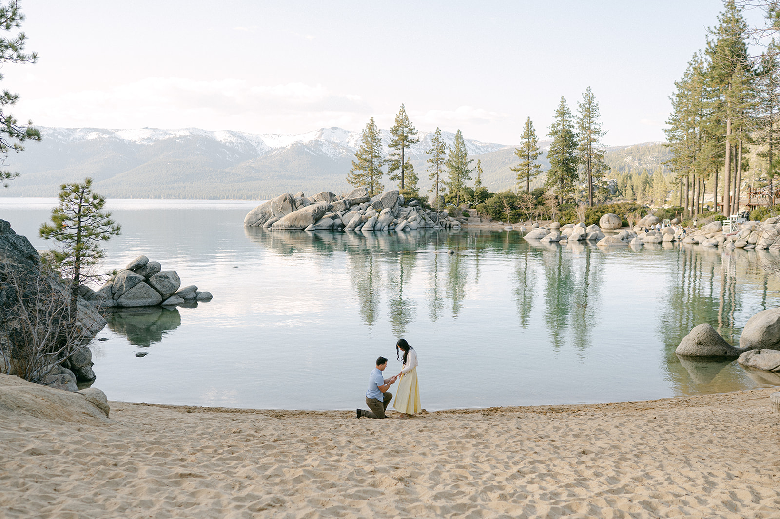 Man proposes to his girlfriend on Sand Harbor Beach in Lake Tahoe