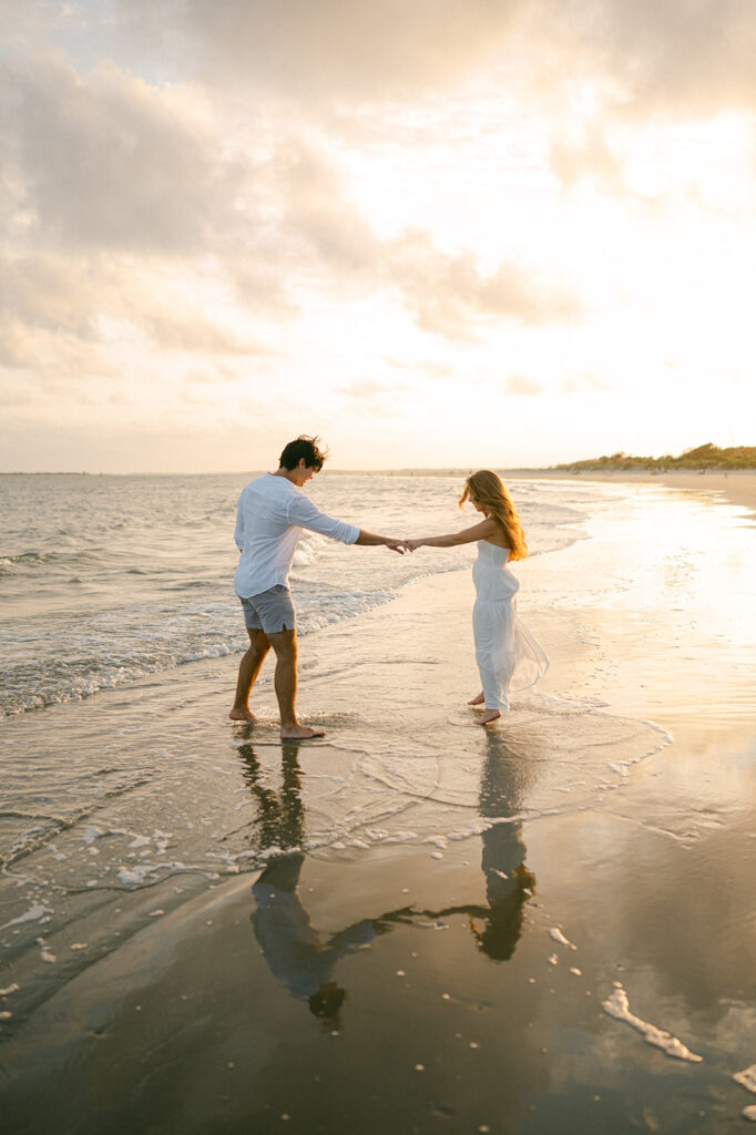 Romantic sunrise engagement photos at Sullivan's Island in Charleston, SC.