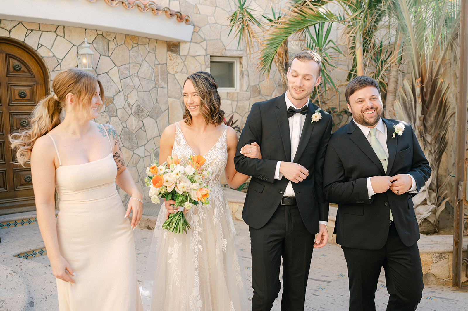 Candid bridal party portrait at a private villa in Cabo San Lucas. 