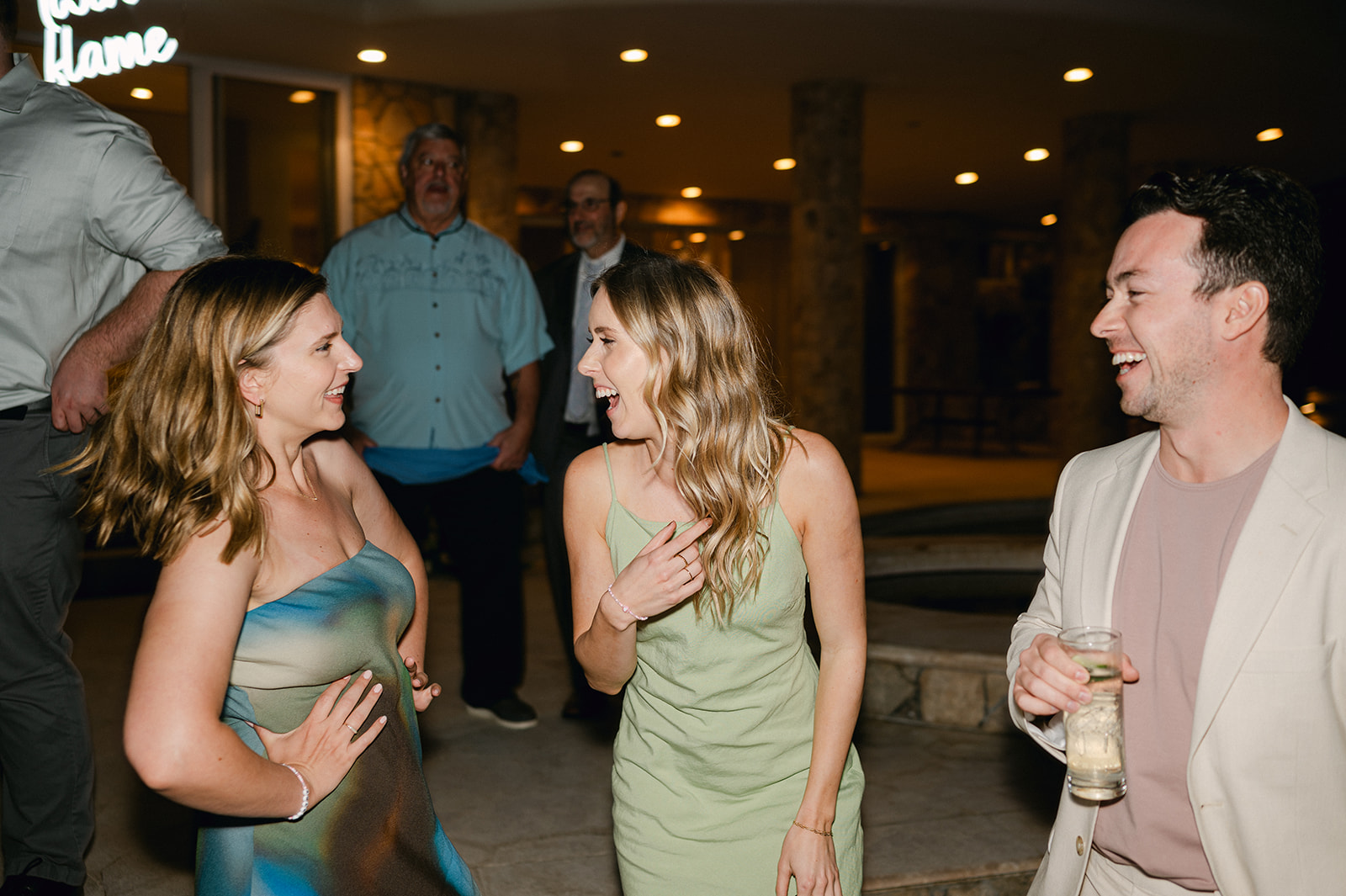 Guests sharing a candid moment while dancing at Villa Marcella in Cabo. 