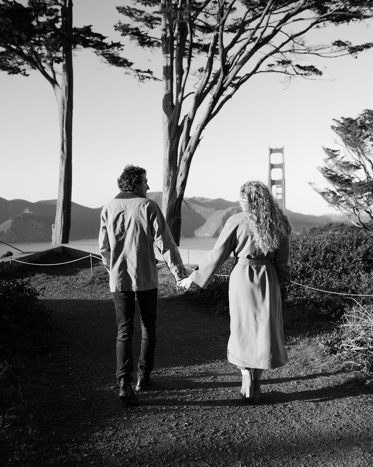 Black and white San Francisco engagement photo at the Golden Gate Overlook. 