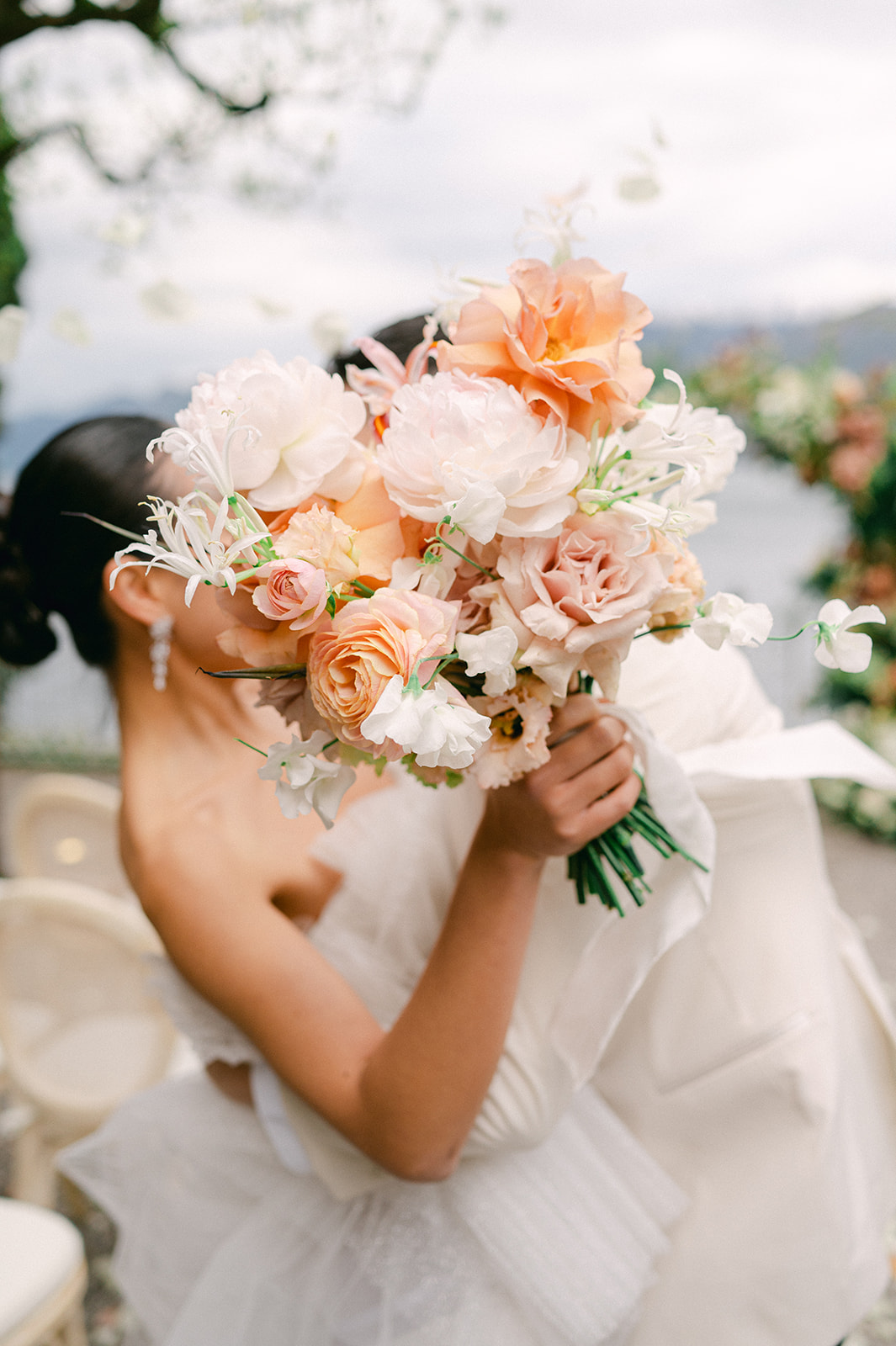 Modern pink and peach pastel wedding floral bouquet at a European wedding in Lake Como. 