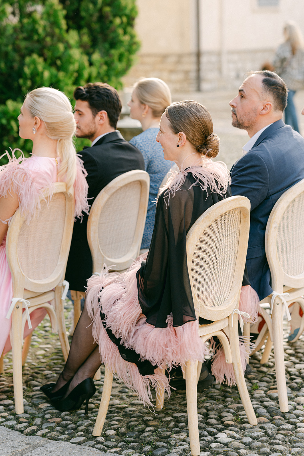 Black-tie garden wedding ceremony in Italy.