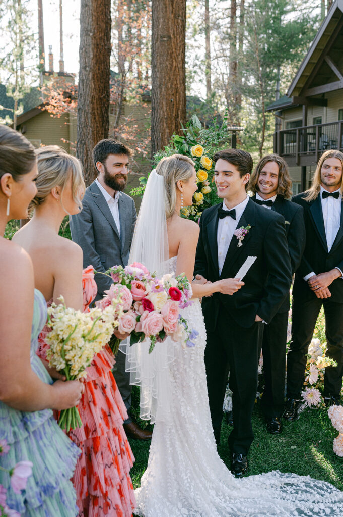 Candid ceremony photo at a whimsical garden wedding at the Hyatt Regency in Lake Tahoe. 