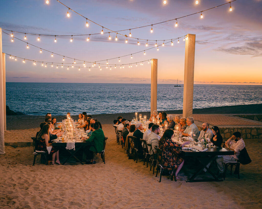 Beachside reception dinner at a multi-day destination wedding in Cabo. 