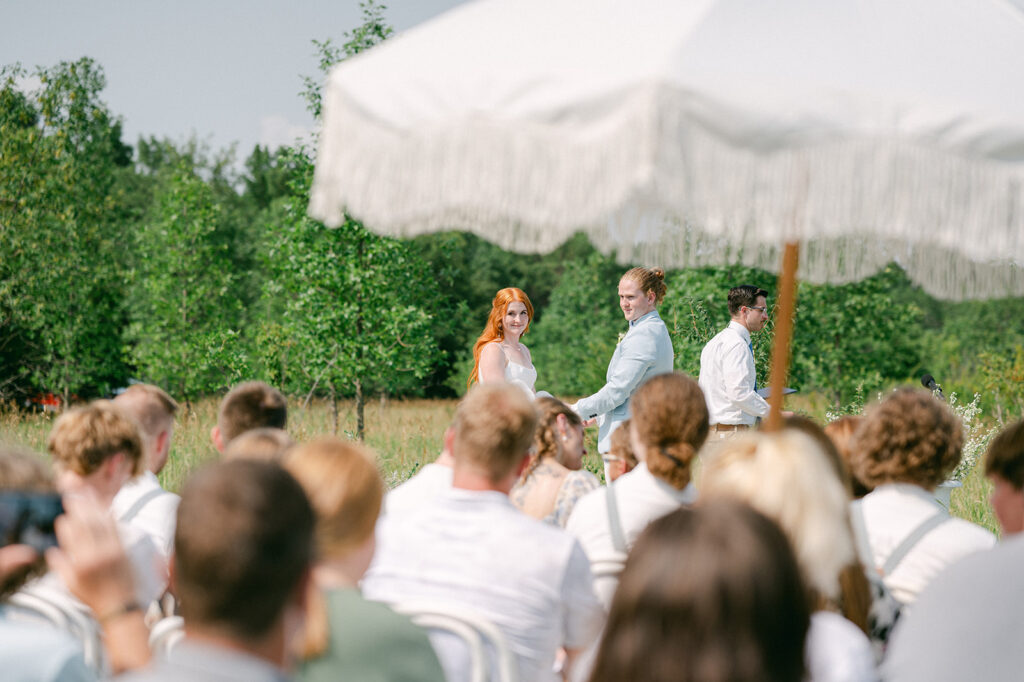 Ceremony at a garden party wedding in Battle Lake, MN. 