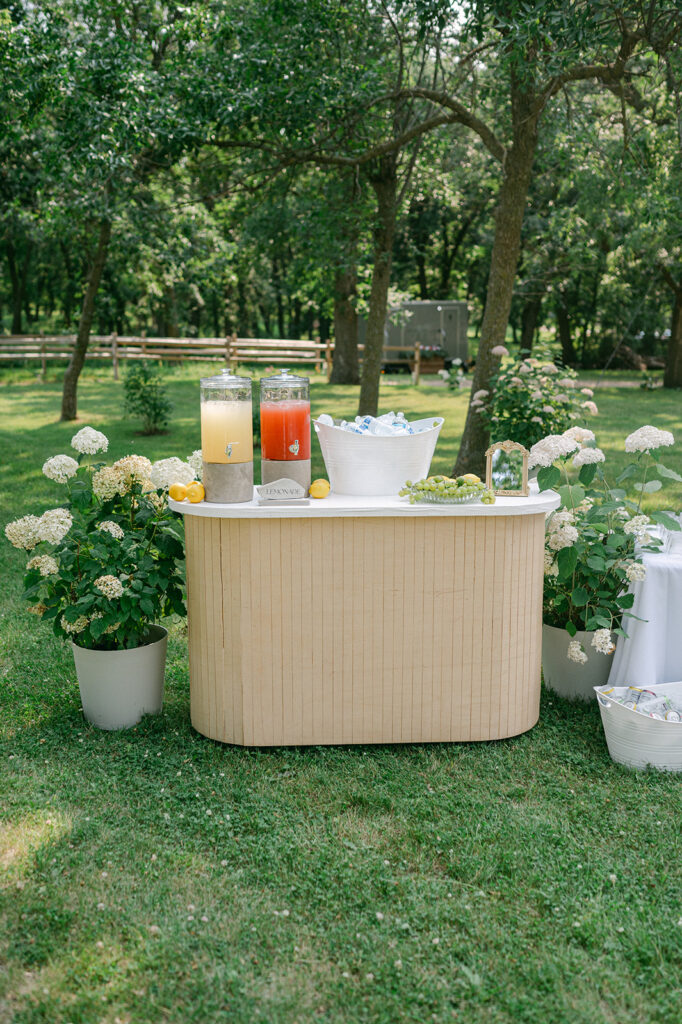 Fluted wood drink table at cocktail hour. 