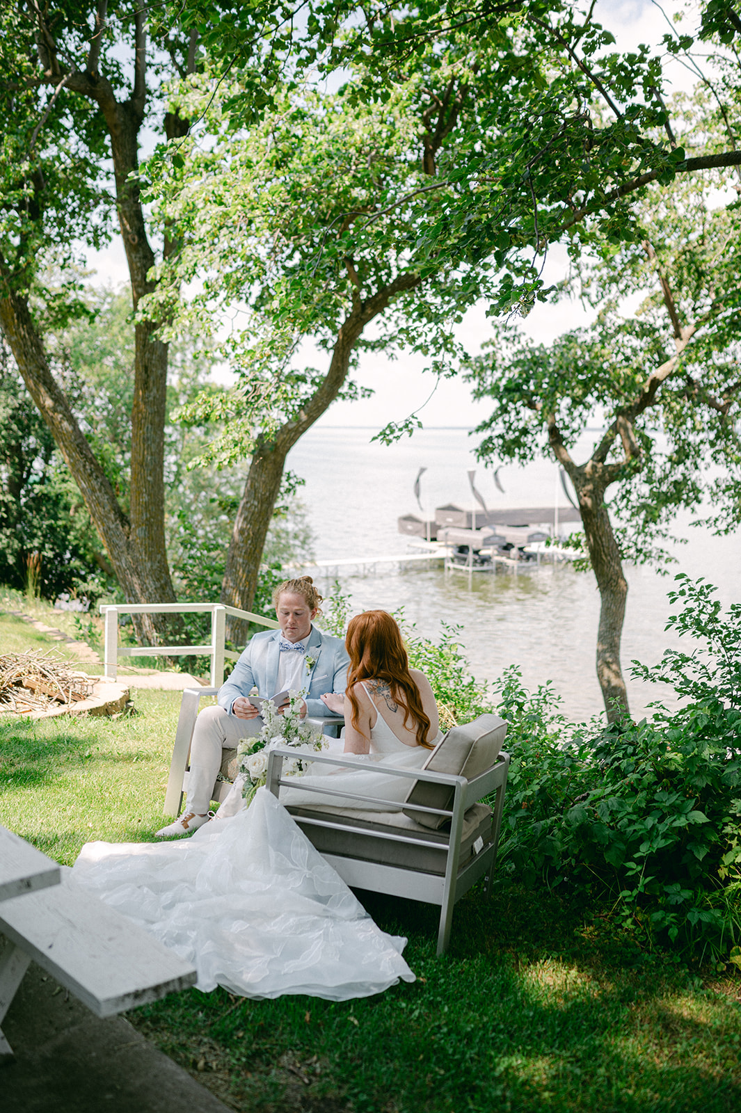 Battle Lake, Minnesota garden party wedding bride and groom private vow reading.