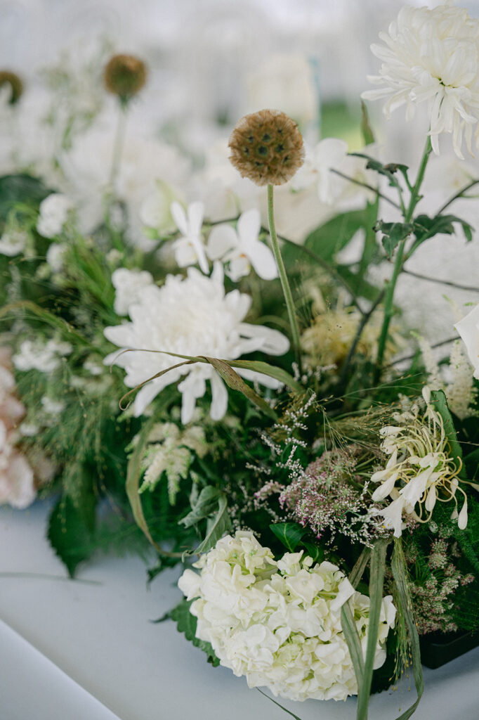 Beautifully arranged organic floral arrangement wedding centerpiece. 