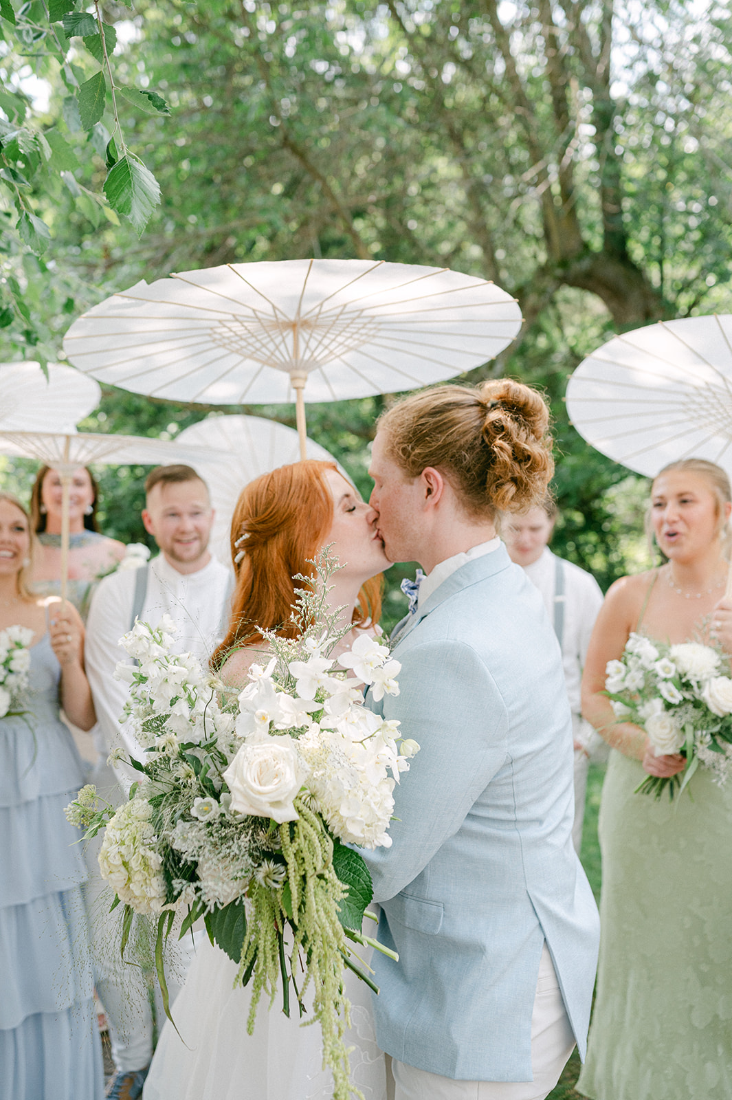 Blue and green garden party wedding at Battle Lake Minnesota. 