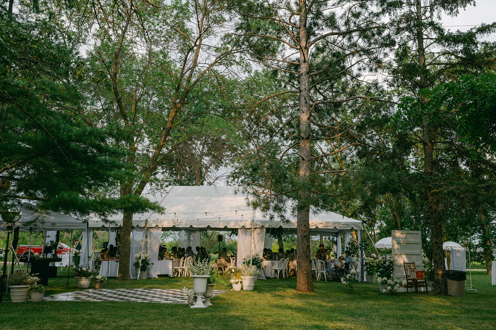 Outdoor tented garden party reception at Battle Lake, Minnesota. 