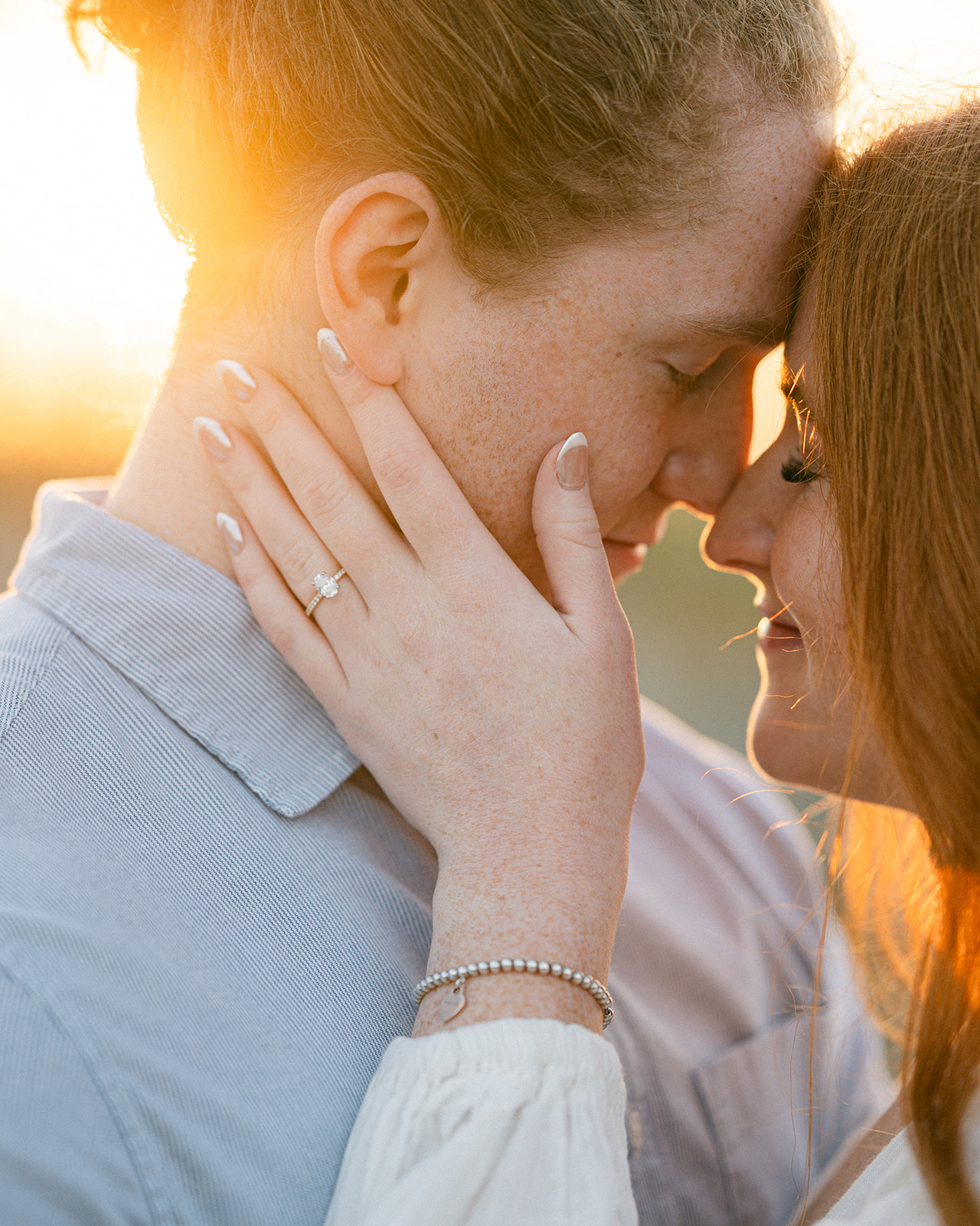 Up close ring shot engagement photo at sunrise. 