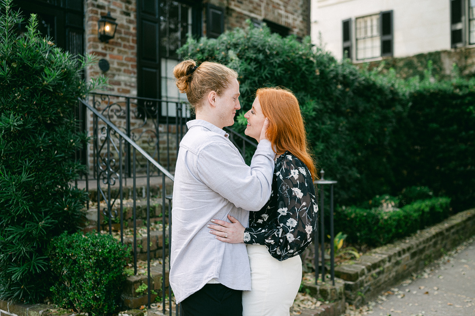 Romantic engagement photo pose for couples, downtown. 