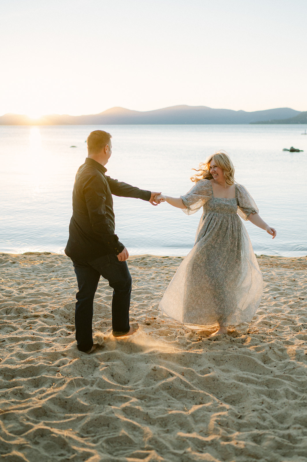 Sunset engagement photos in Lake Tahoe at Sand Harbor. 