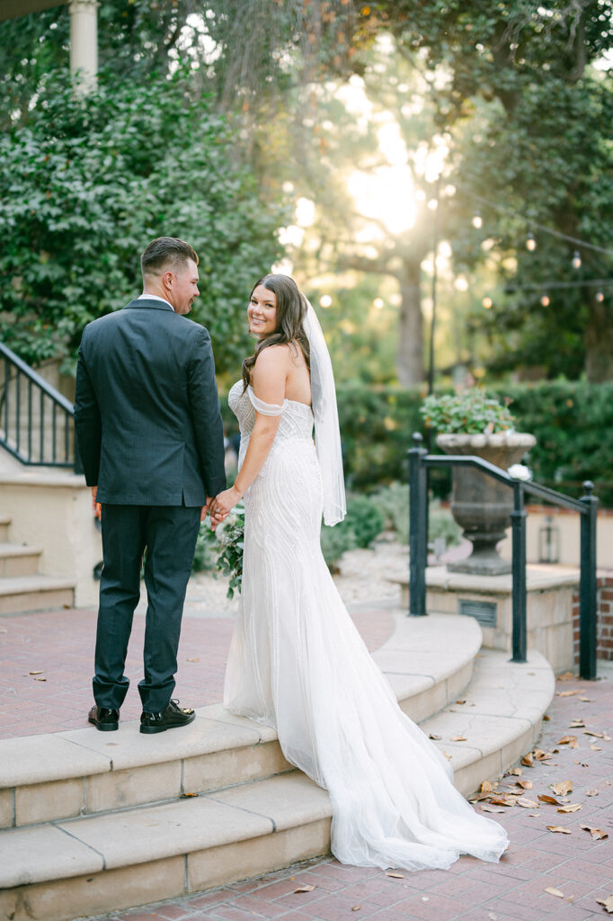 Wedding day bride and groom sunset portrait captured by Sarah Woods Photography.