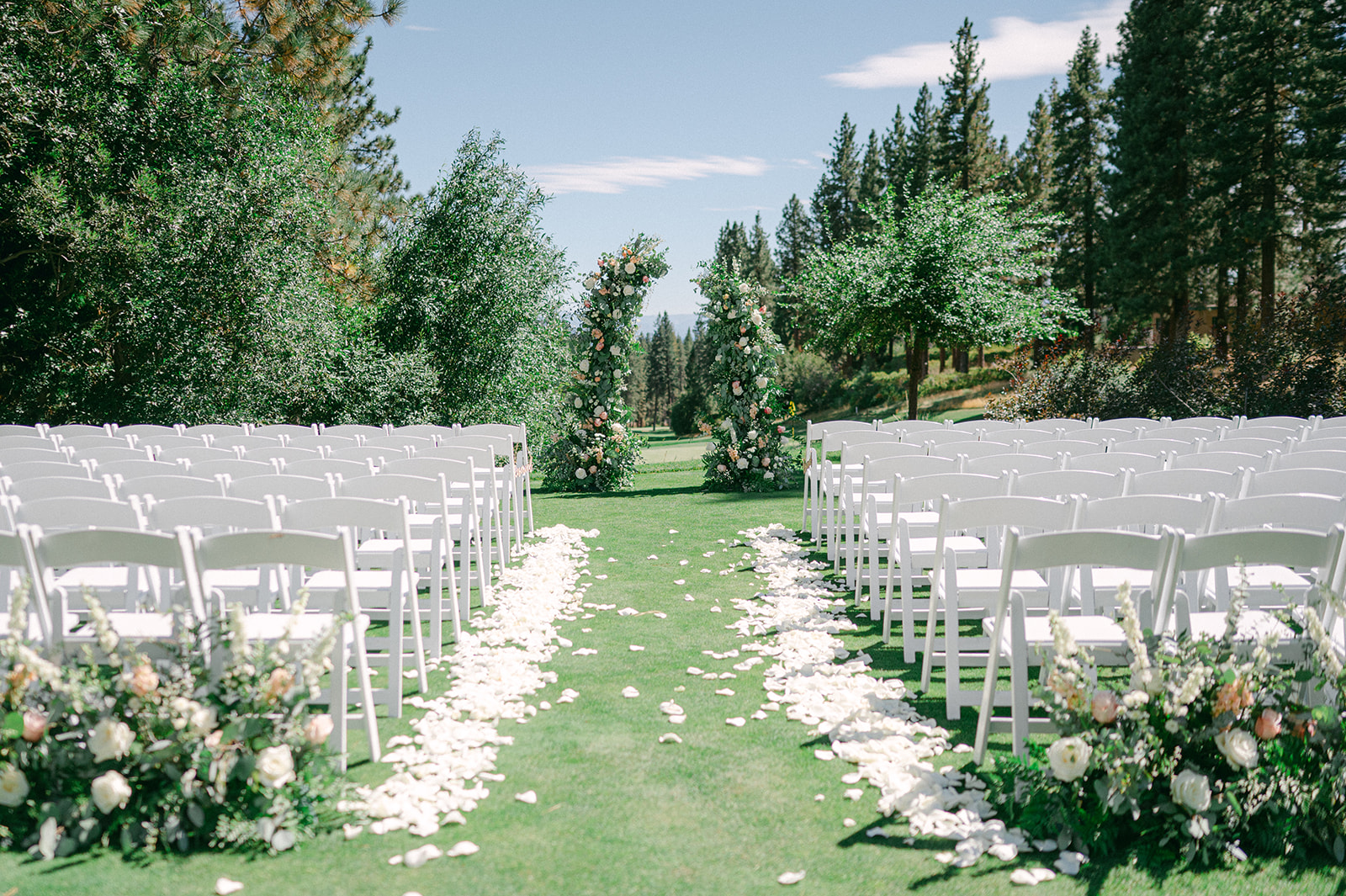 Outdoor wedding ceremony details at a Lake Tahoe celebration captured by Sarah Woods Photography.