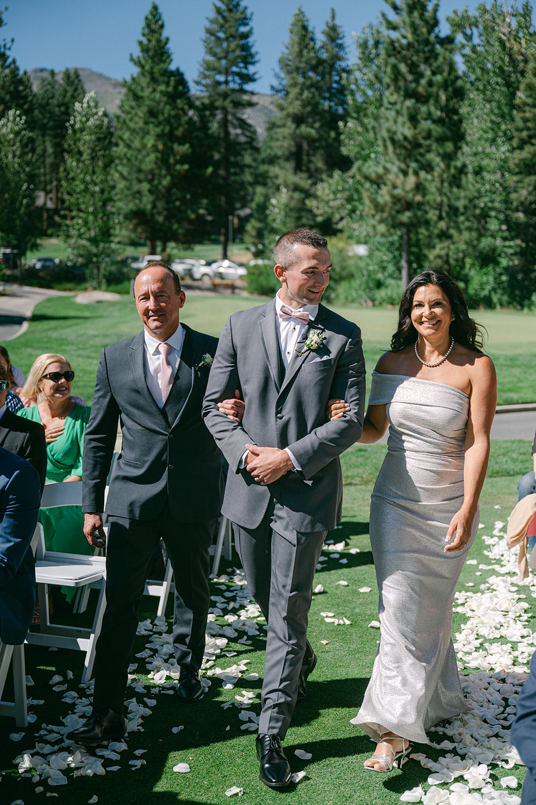 Candid ceremony moments captured at a timeless summer wedding in the mountains of Lake Tahoe.