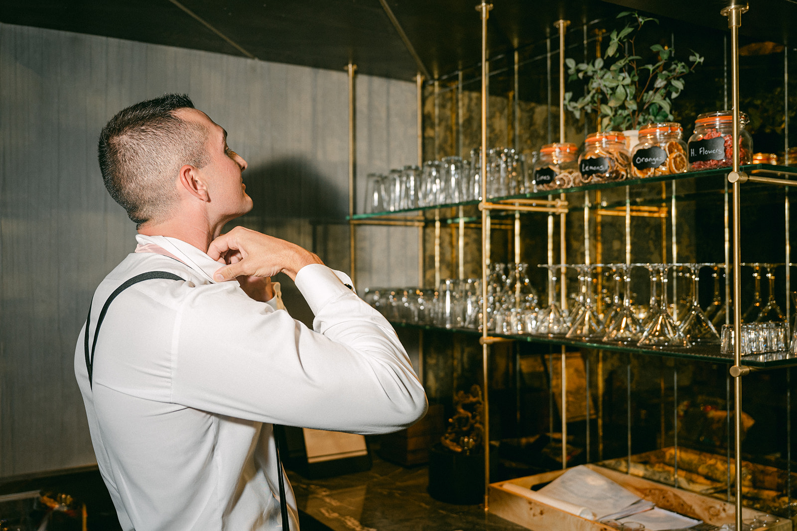 Groom getting ready at The Chateau at Incline Village bar. 