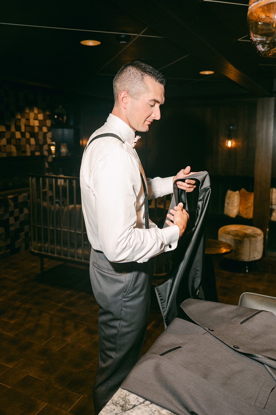 Groom getting ready at The Chateau at Incline Village. 