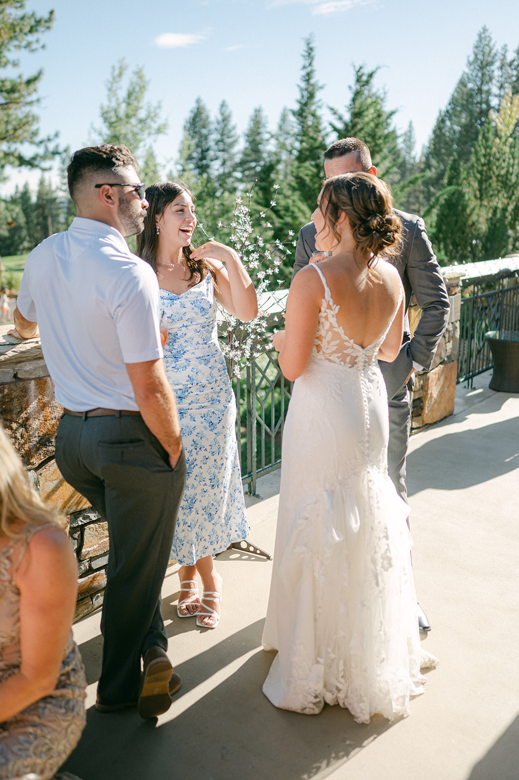 Candid cocktail hour portraits at the Chateau at Incline Village by Sarah Woods Photography in Lake Tahoe. 