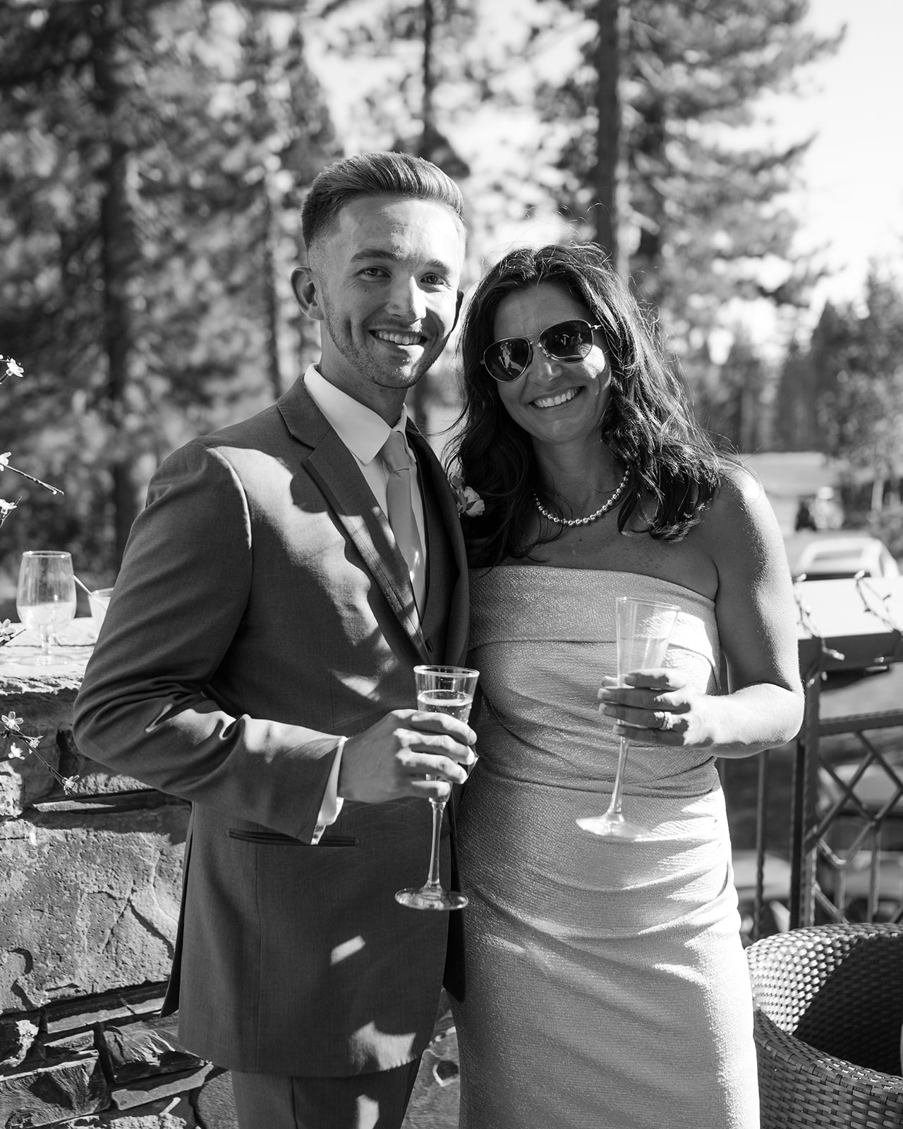 Black and white cocktail hour portrait on the deck at the Chateau at Incline Village. 