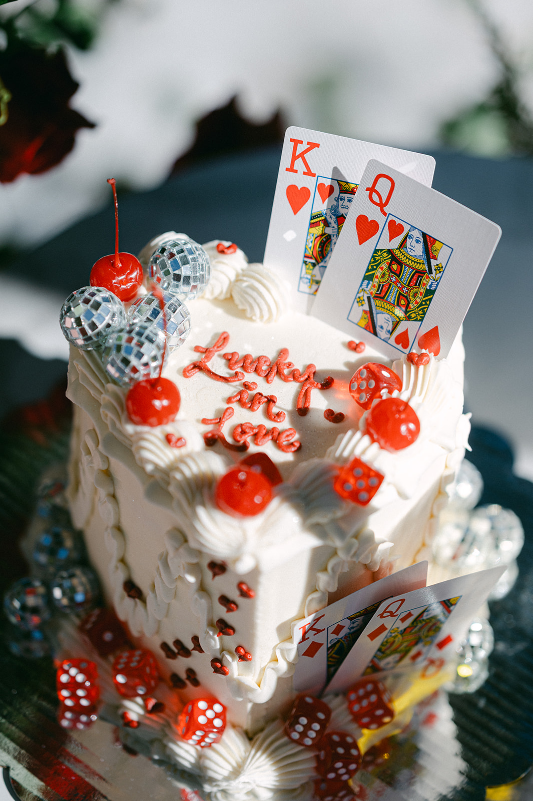 Lucky for love, King and queen of hearts disco themed proposal cake.