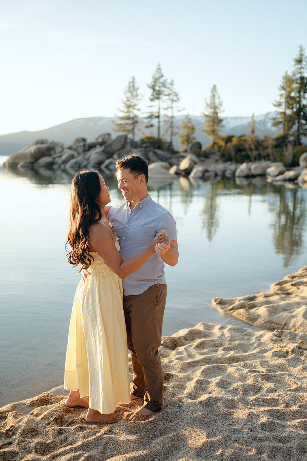 Couple dancing at sunset during their Lake Tahoe summer engagement session.