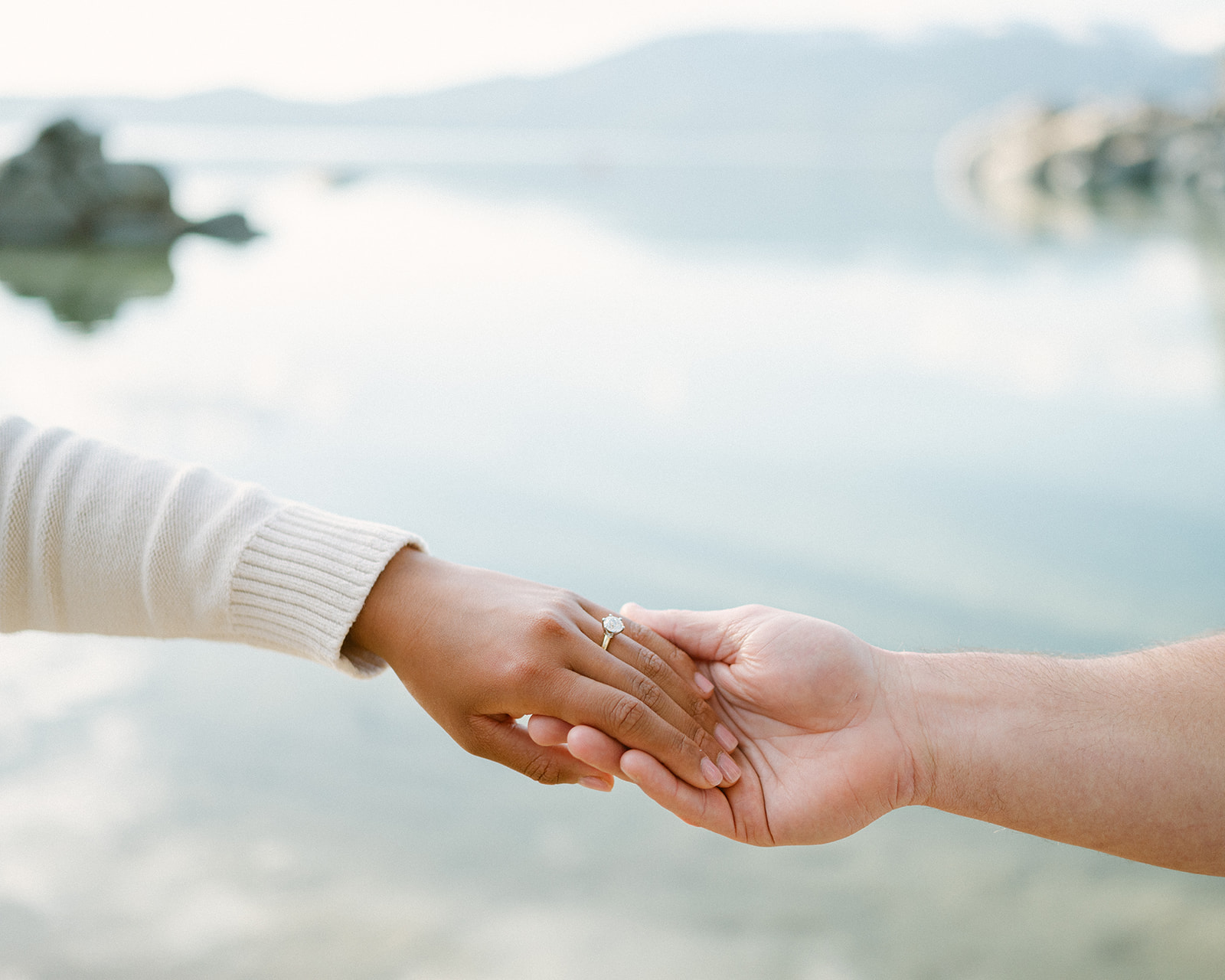Up close engagement ring shot at a surprise proposal session in Tahoe.