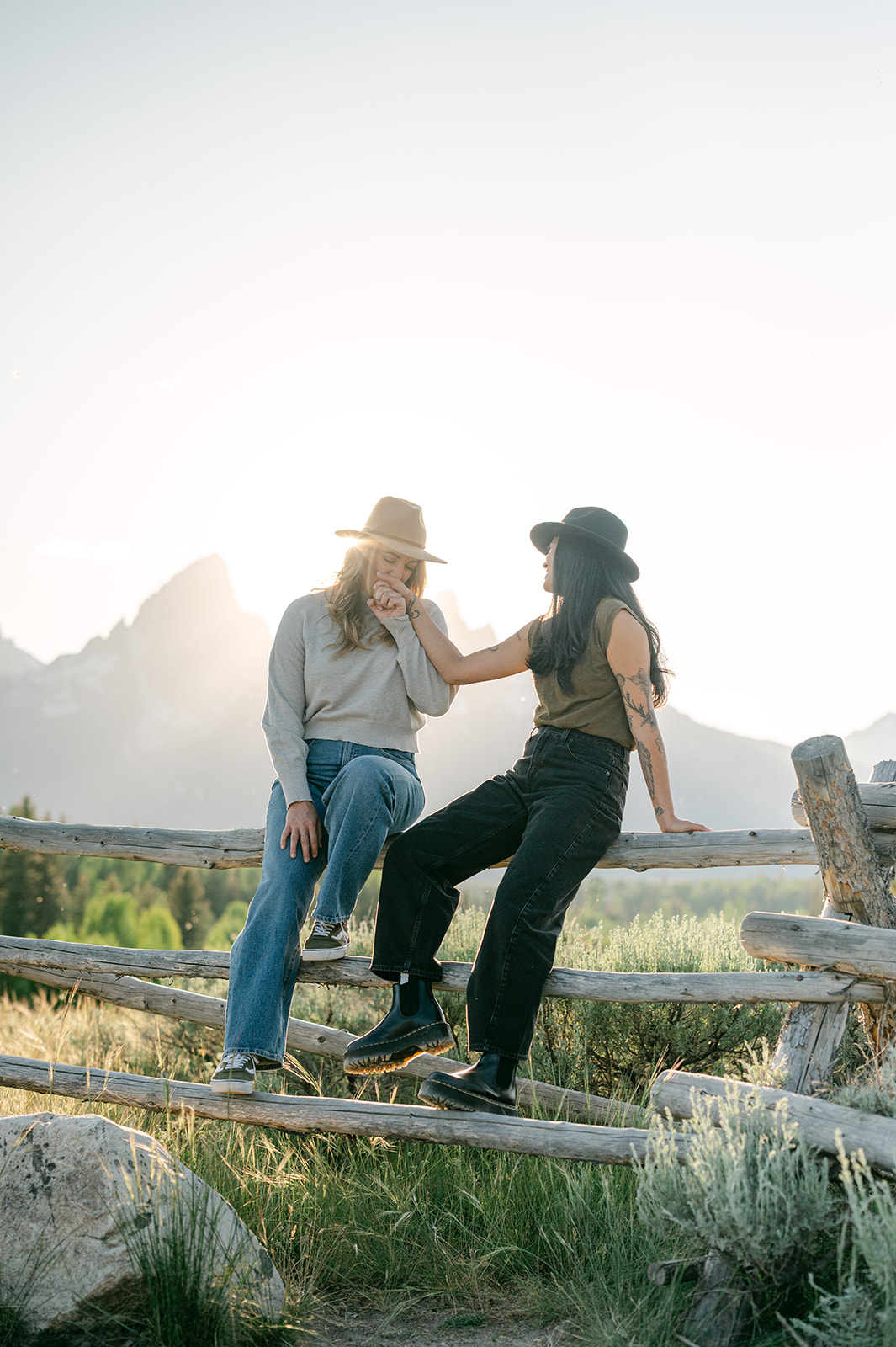 Western-influenced wlw photoshoot in the Grand Tetons, celebrating their anniversary.