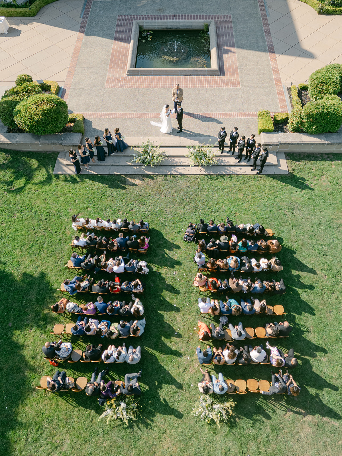 Birds eye view of a courtyard wedding ceremony.