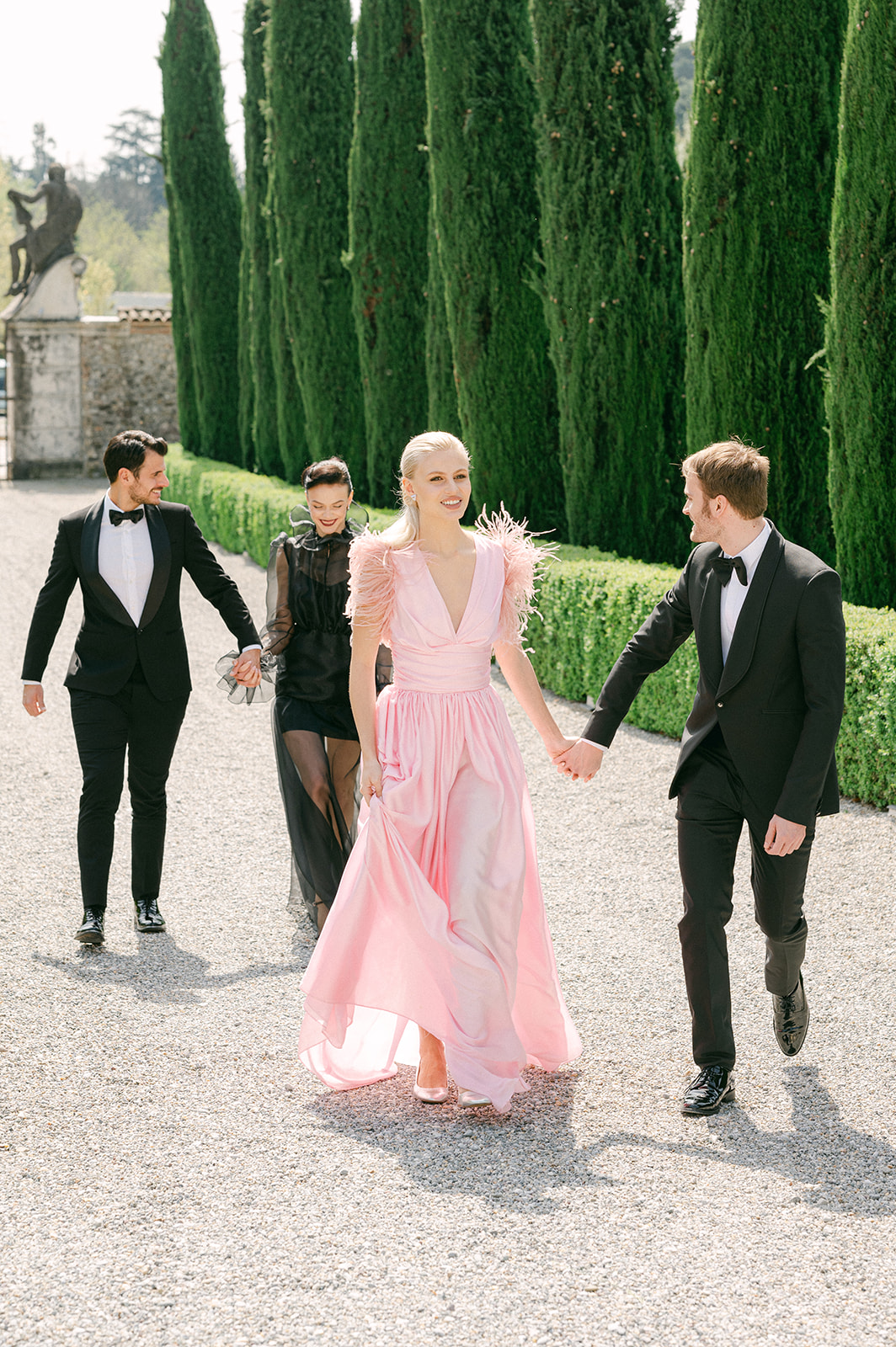 Wedding guests walking to the ceremony | candid wedding photography.