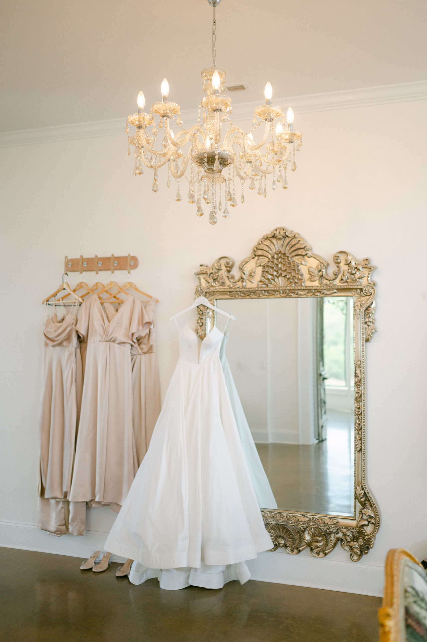 Bride and bridesmaid dress hanging photo | timeless wedding photography.