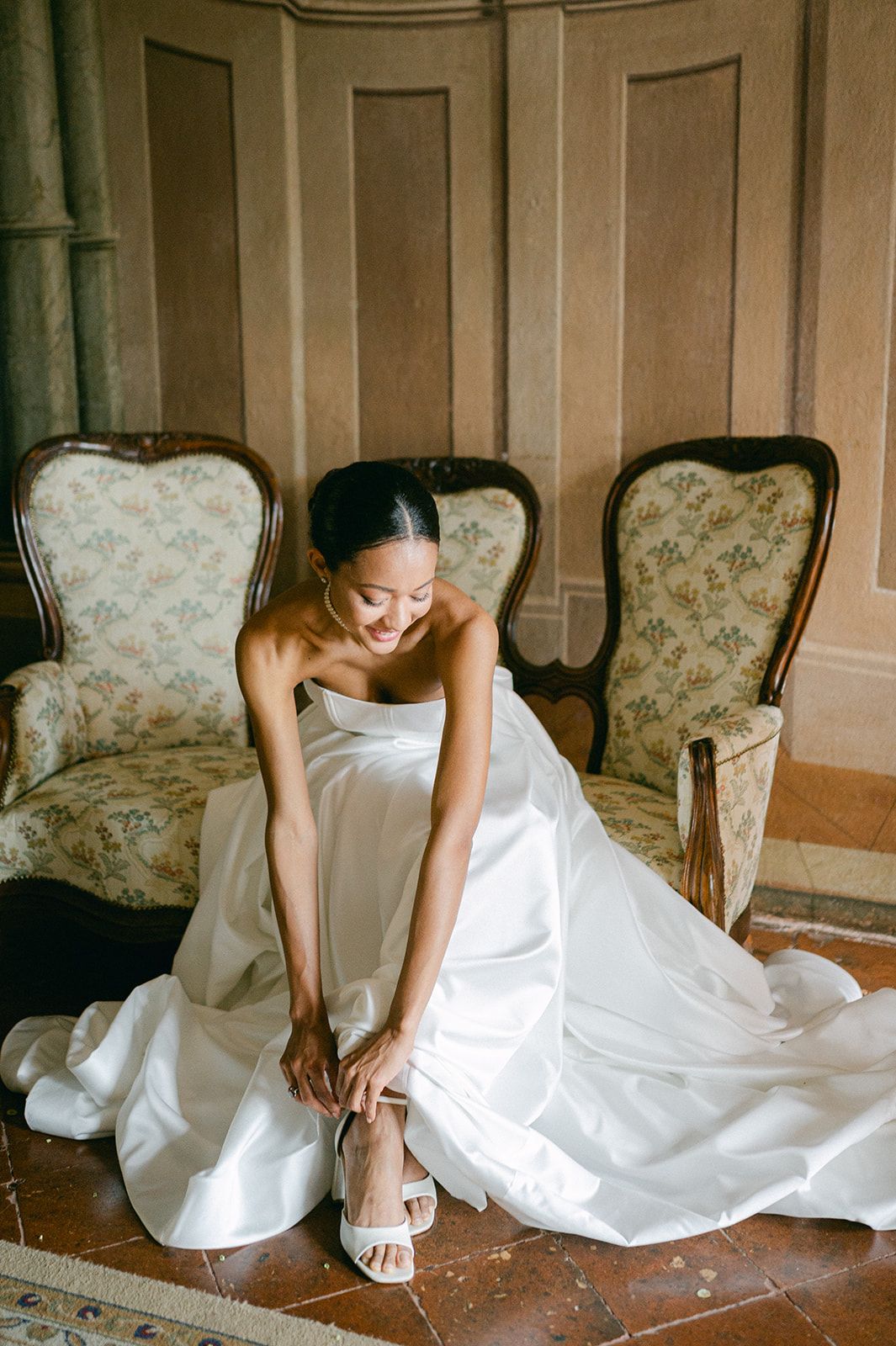 Bride putting on her shoes | timeless getting ready wedding photography.