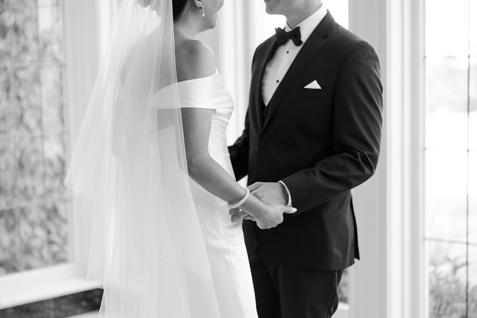 Bride and groom sharing a quiet moment during first look.