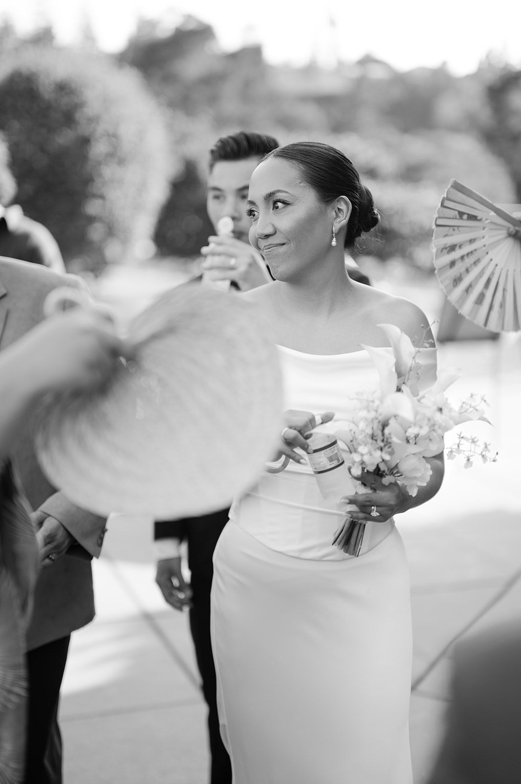 Documentary style candid moment of bride during cocktail hour. 