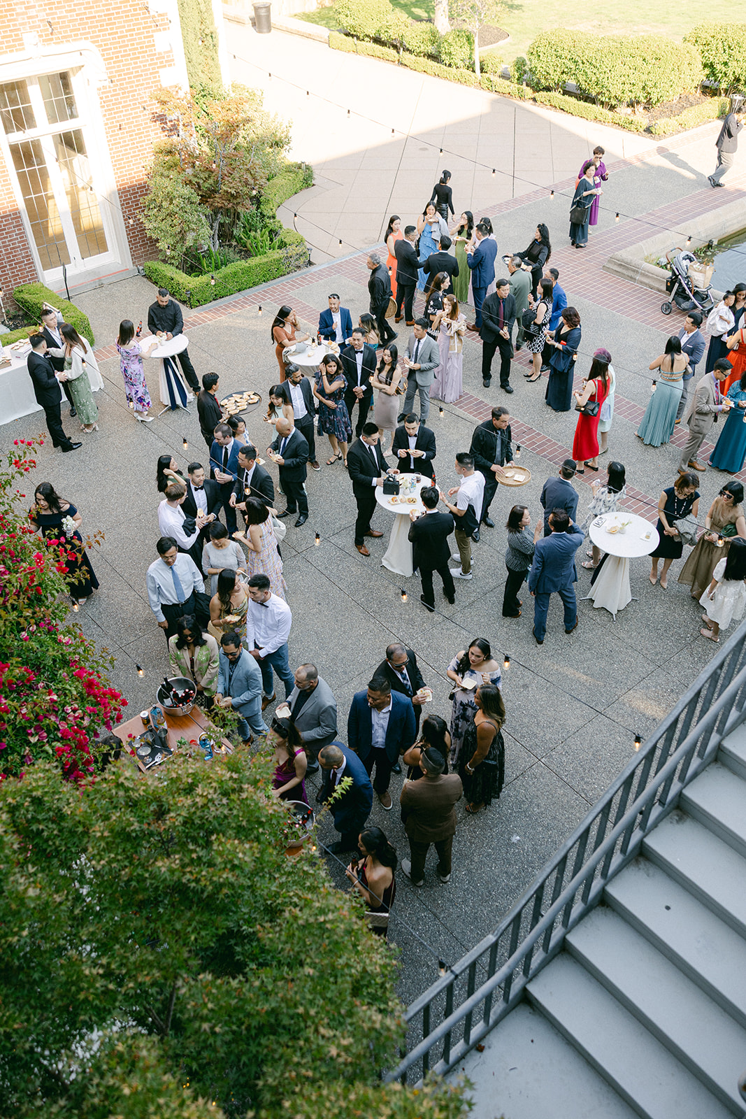 Overhead shot of cocktail hour in the courtyard at Kohl Mansion. 