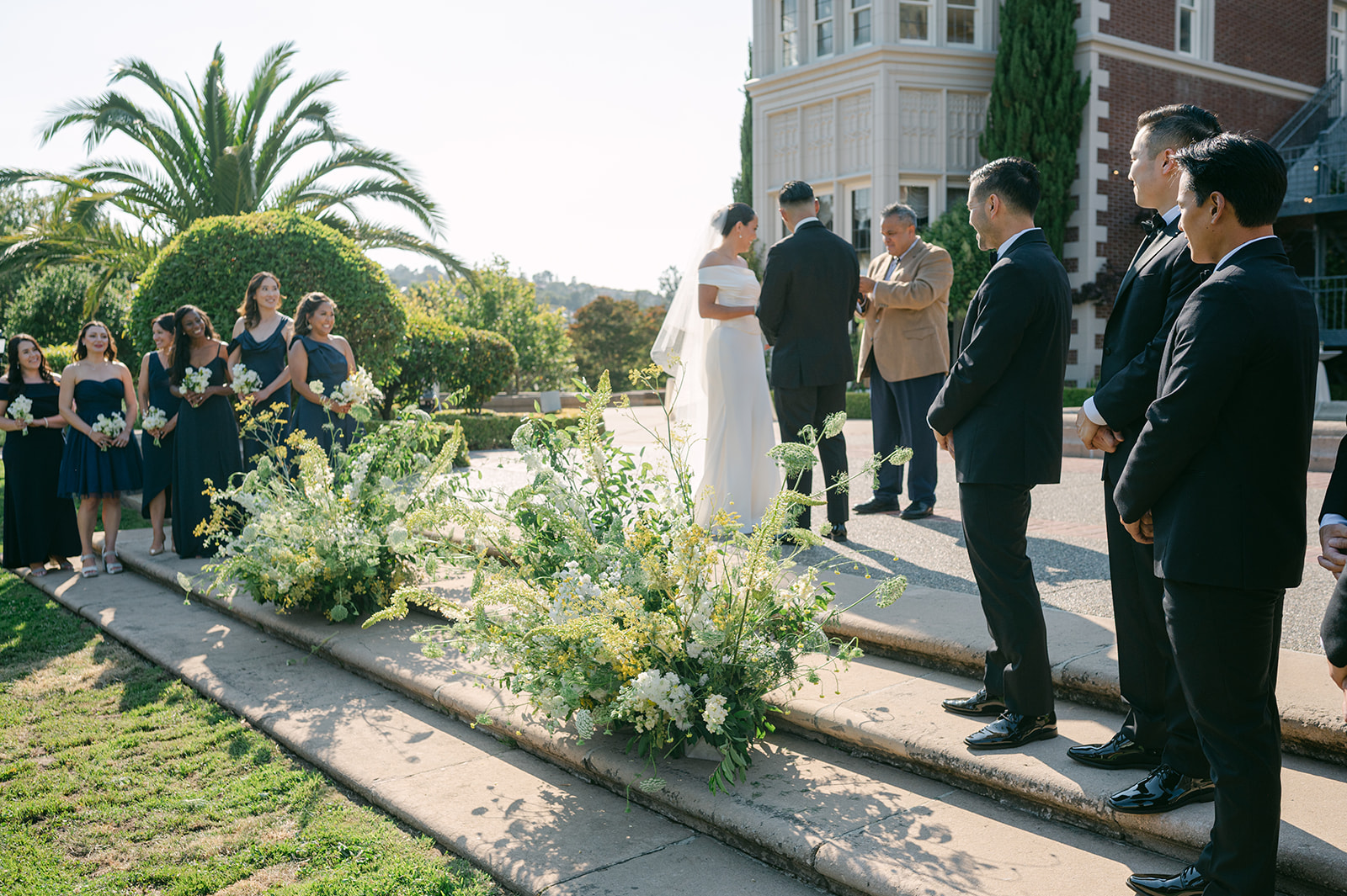 Wide view of outdoor wedding ceremony at Kohl Mansion.
