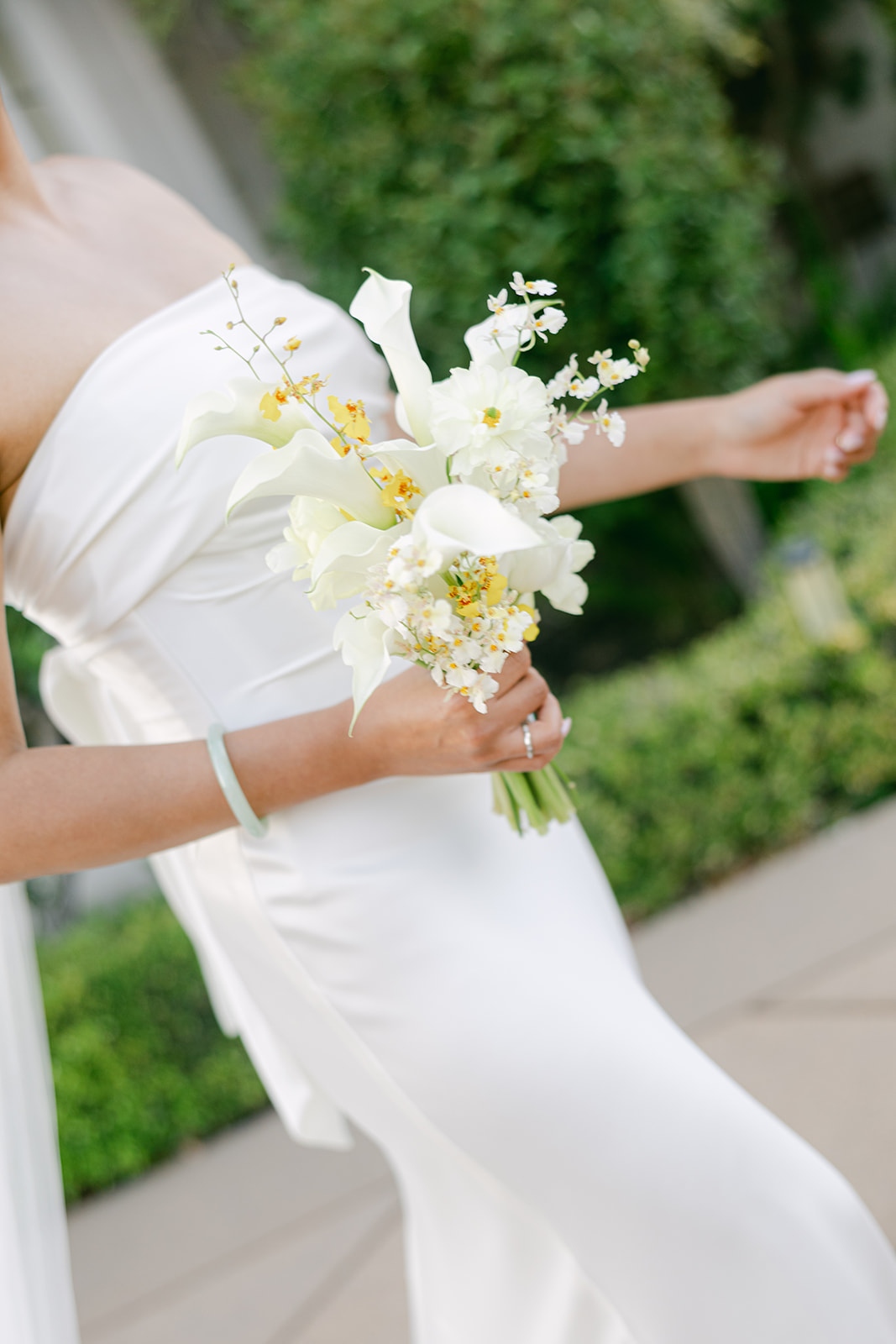 Close up candid of bride and her bouquet. 
