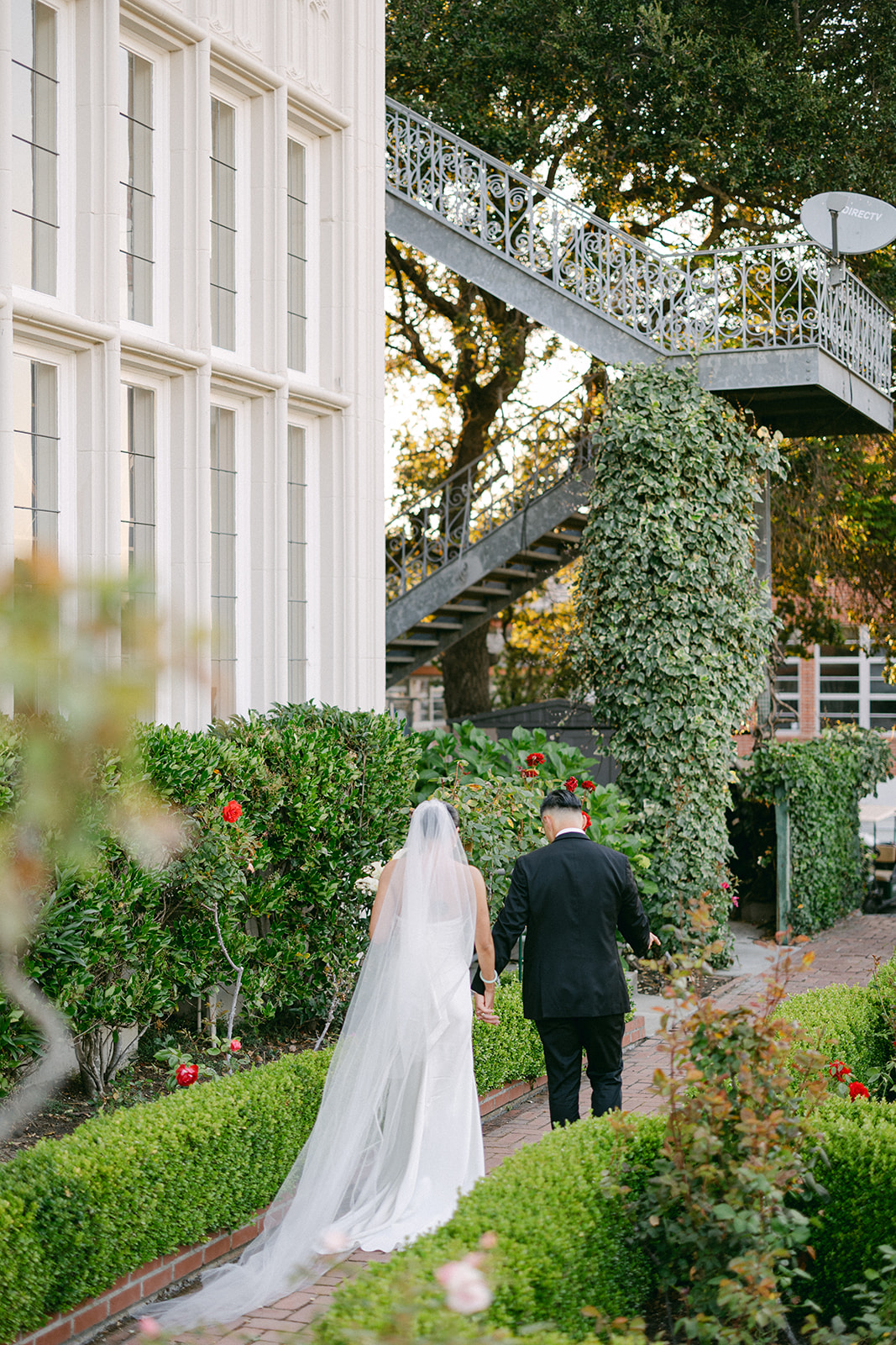 Bride under-the-veil shot in timeless dress.