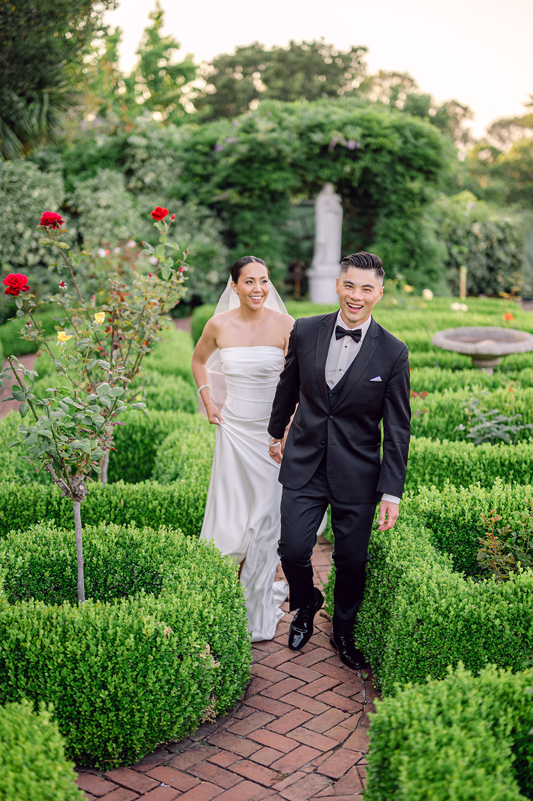 Romantic sunset portraits in courtyard garden at Kohl Mansion.
