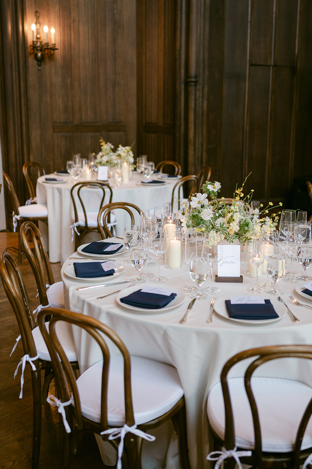 Editorial detail shot of reception tables inside Kohl Mansion wedding.