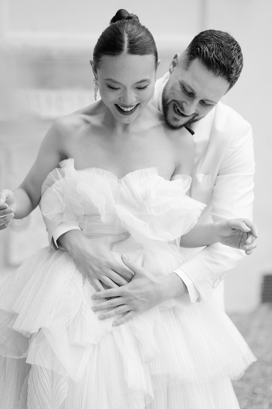 Candid bride and groom wedding photos.