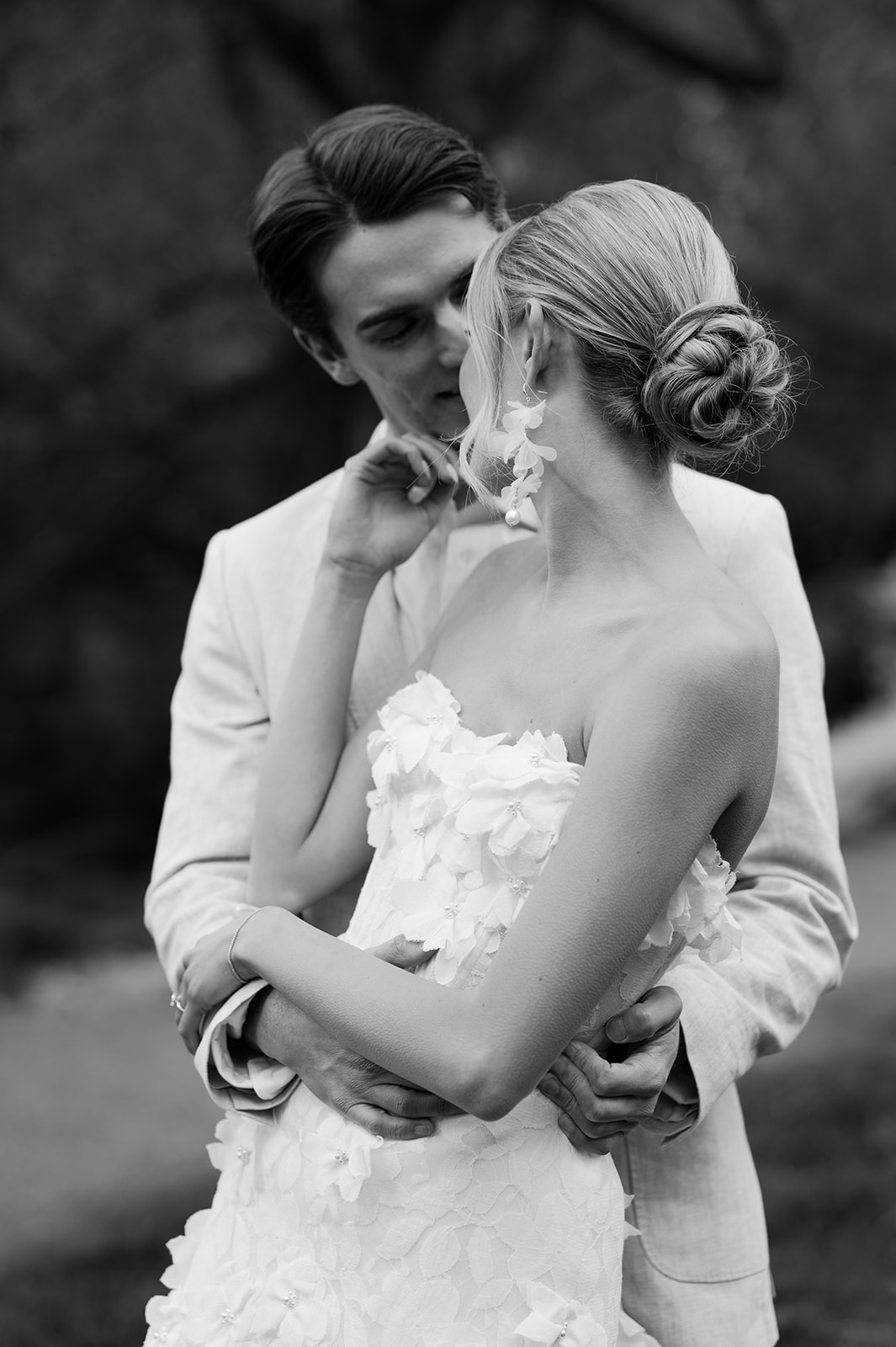 Bride and groom sharing an intimate moment during their portraits.