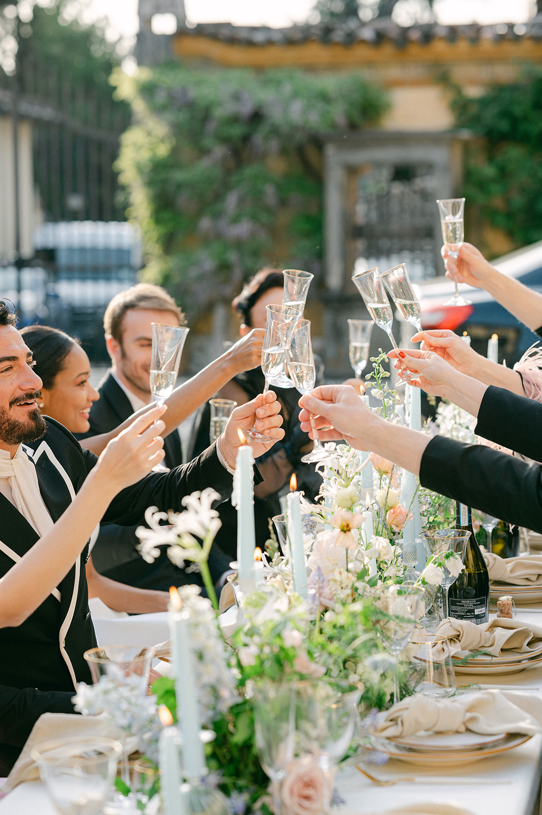 Toasts with candid laughter | unposed wedding reception photography.