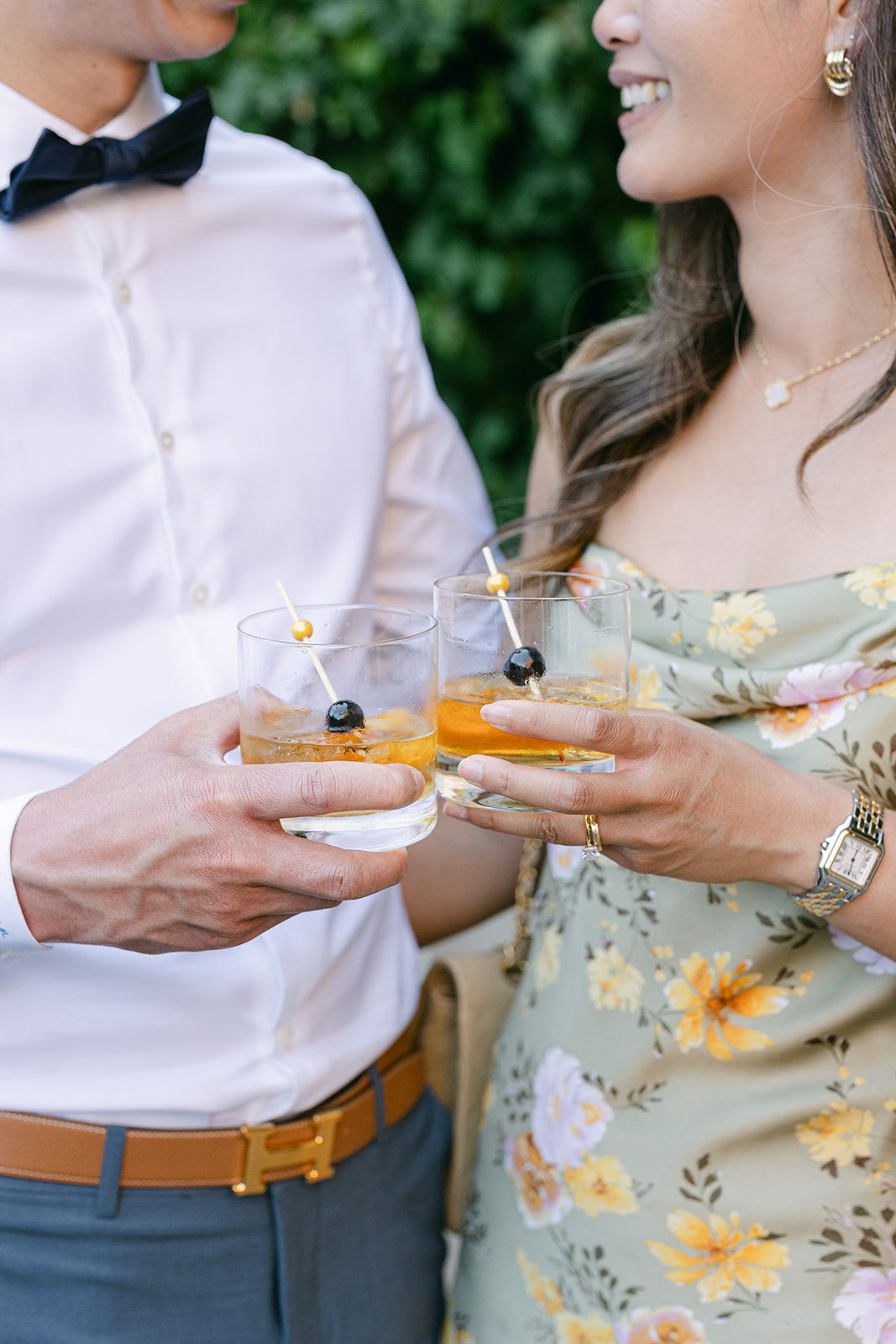 Wedding guests having a drink at cocktail hour | wedding detail shot.