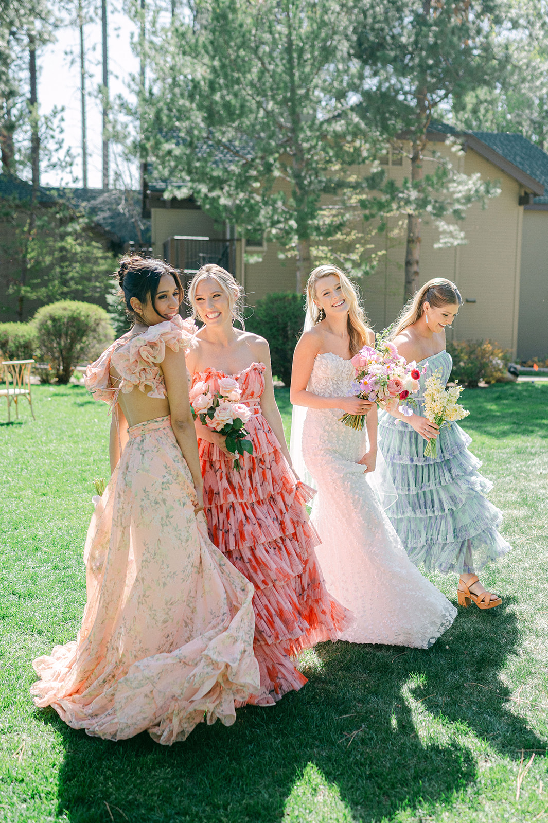 Bridal party walking and laughing together | candid bridal party photography.