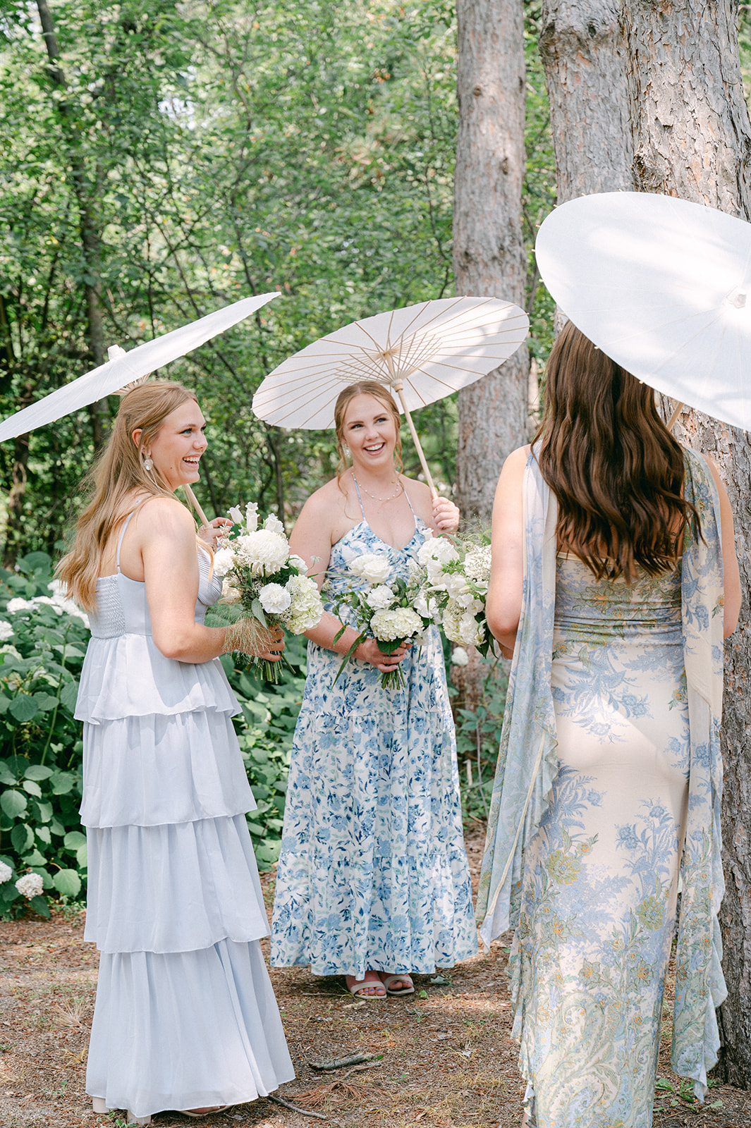 Bridesmaids chatting in a circle | documentary style wedding photography.
