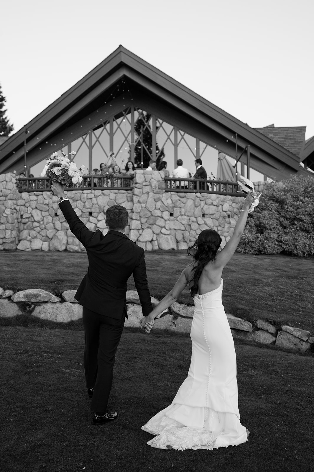Couple waves to their wedding guests at Edgewood Resort Lake Tahoe.