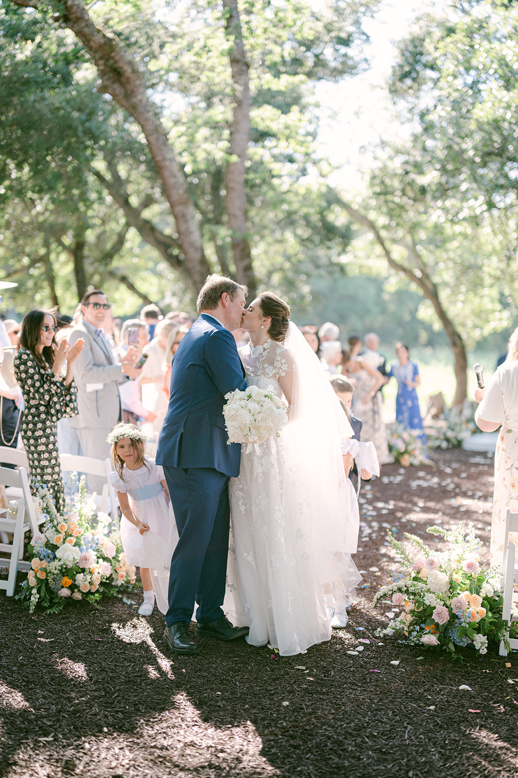 Newlyweds celebrating first kiss at Sonoma Vineyard Estate.